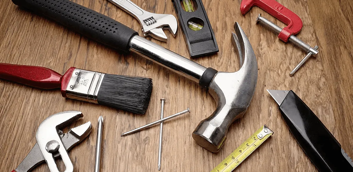 Handyman tools laid out for home repair and maintenance work in Louisville, KY